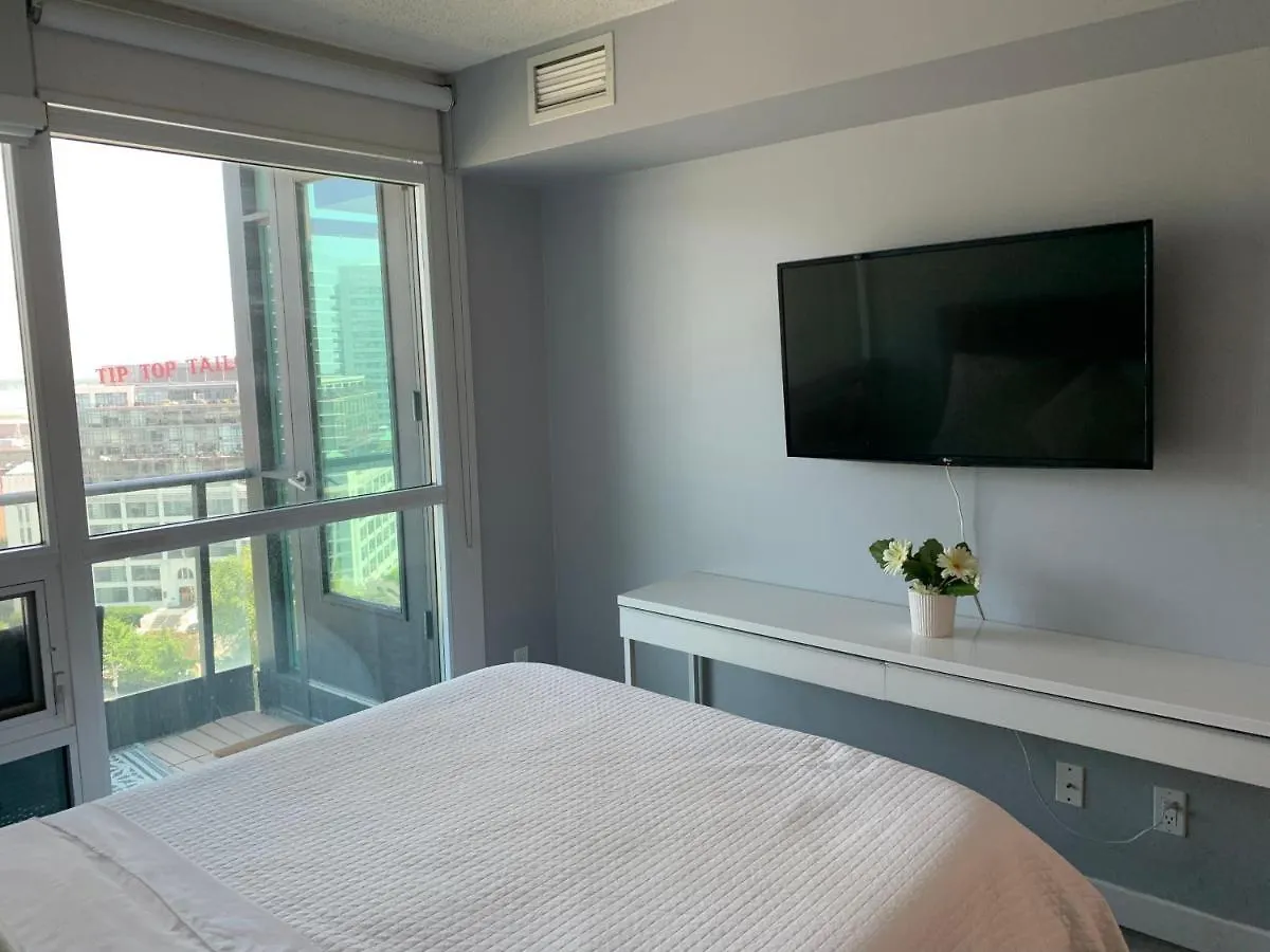 Апартаменты Downtown Waterfront Suites With Cn Tower Views Торонто